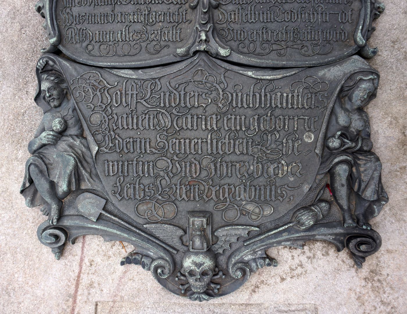 epitaph for Wolfgang Endter and wife Maria Oeder Nuremberg, Johannisfriedhof, grave number P122 Wolff Endters bookseller, wife Mariae a née Ederin his dear landlady and her other body heirs funeral