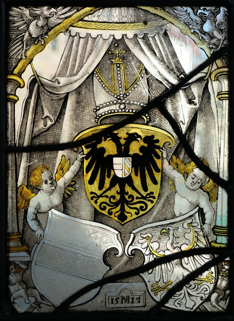 Fenster nII 1 des Sebalder Chörleins Putti with coat of arms triple band: above the double-headed imperial eagle with heart shield Austria/Burgundy, below the two full coats of arms of the Archduchy of Austria and the County of Tyrol.