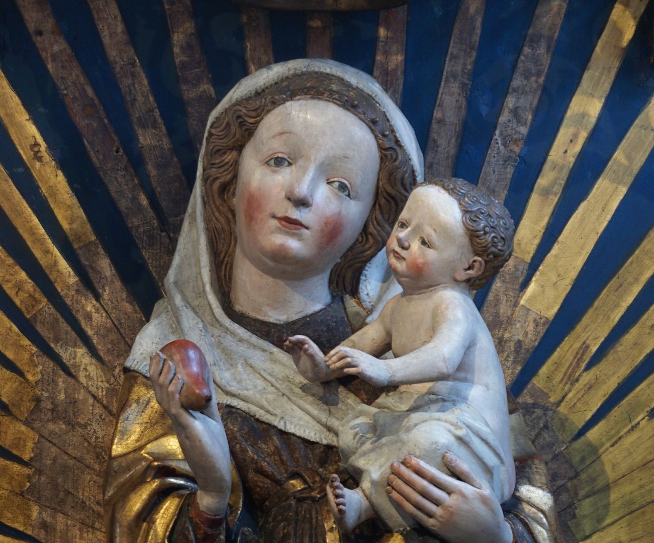 Altar of the Beautiful Mary Mary with the infant Jesus, holding a pear in her right hand