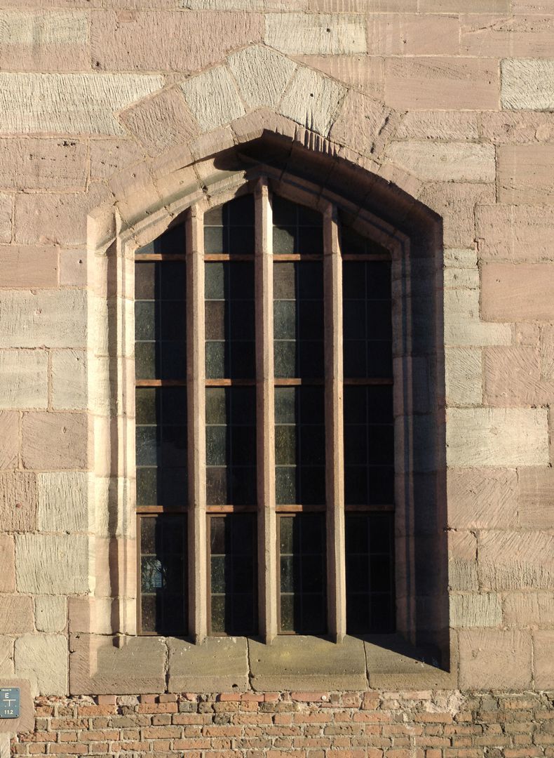 Hospice of the Holy Spirit North front, window with pointed cornered arches