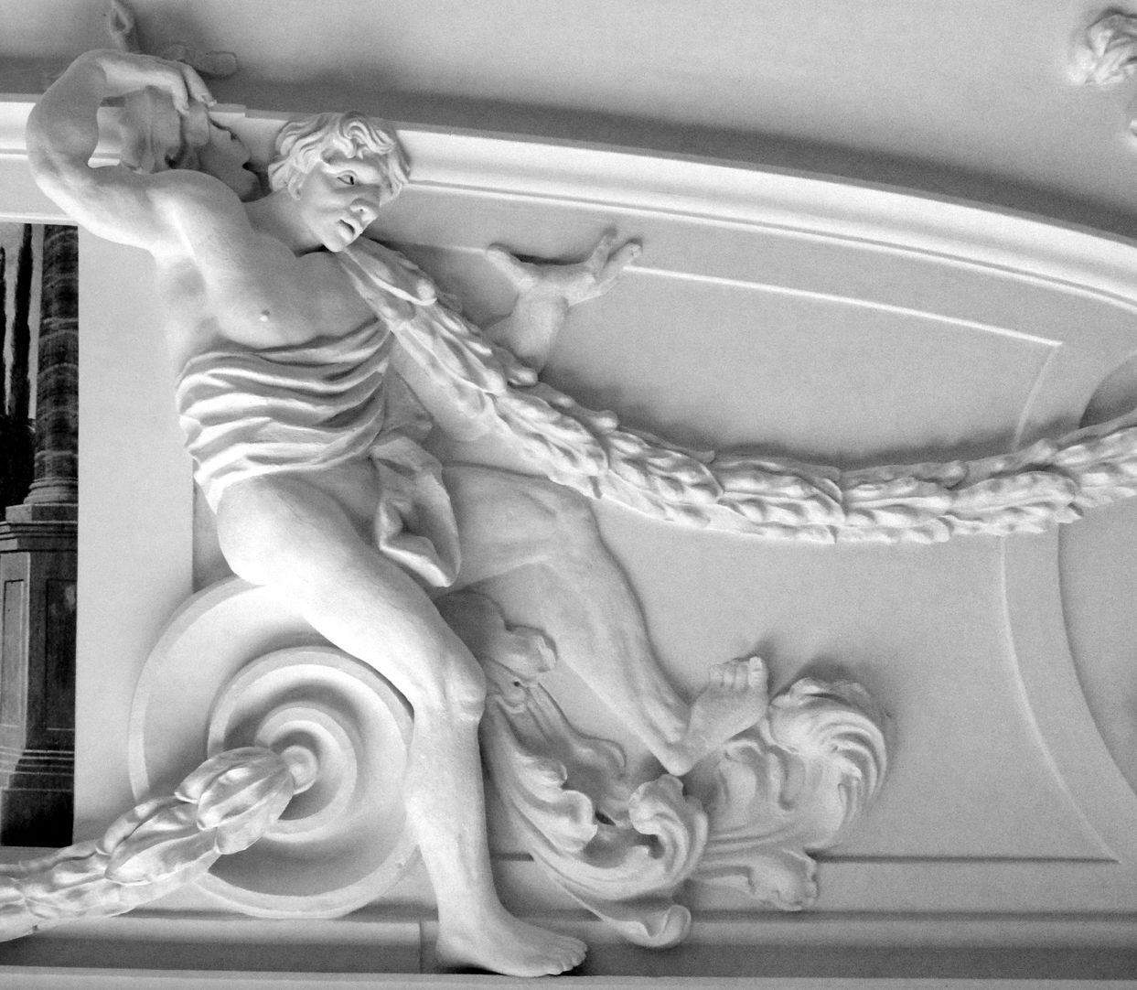 Stucco ceiling from the garden hall of the former Merkel estate Man with a garland sitting on a volute in the north east part of the ceiling