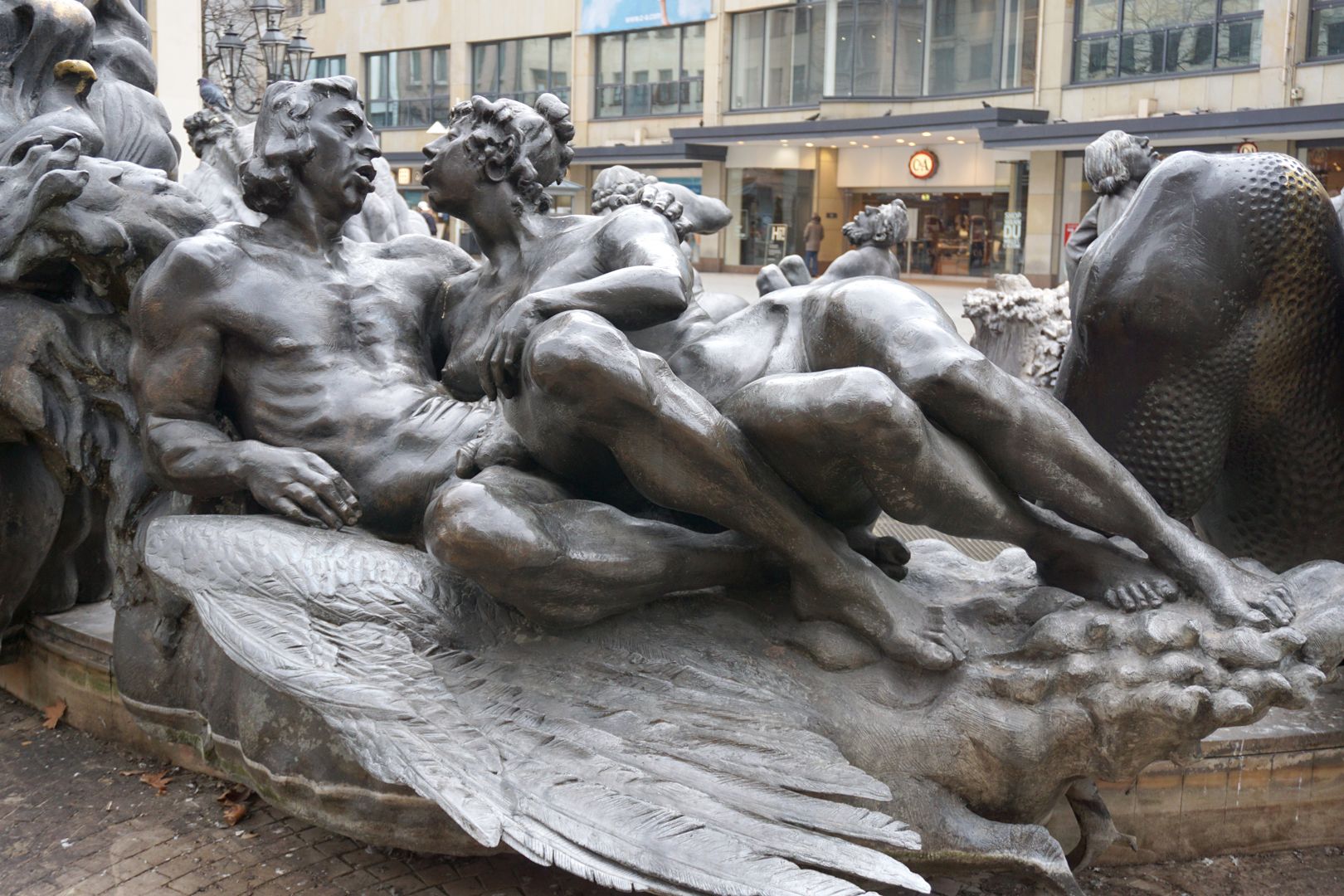 Marriage carousel/ Hans Sachs Fountain Loving couple on the "Swan Carriage." /"The naked couple kisses in the feathers."/ ...the swan is a symbol of love and besides it appears frequently as a carousel carriage.