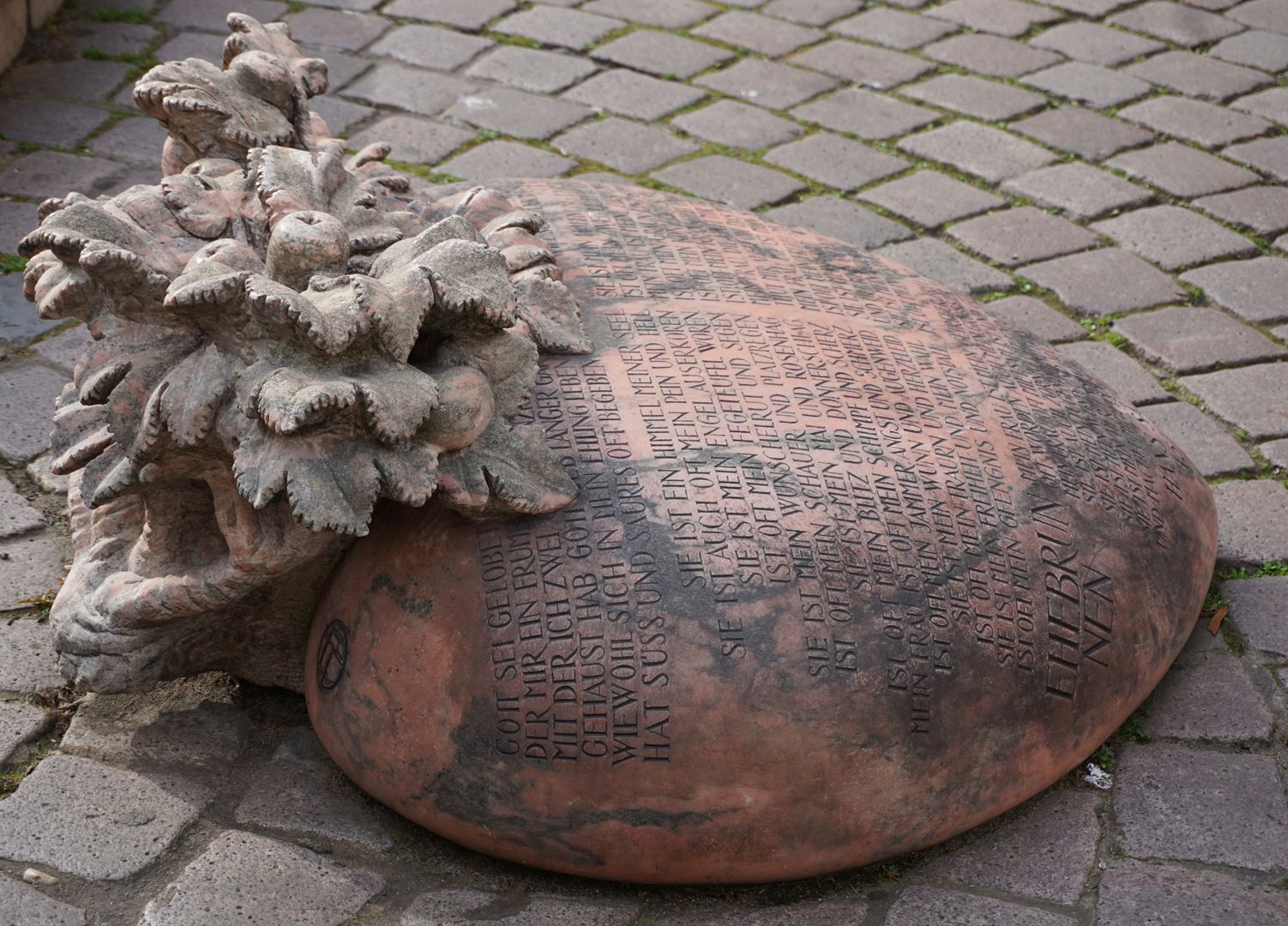 Marriage carousel/ Hans Sachs Fountain "The heart as a popular symbol of love is inlaid in the pavement of Ludwigsplatz like a tombstone. (J.W