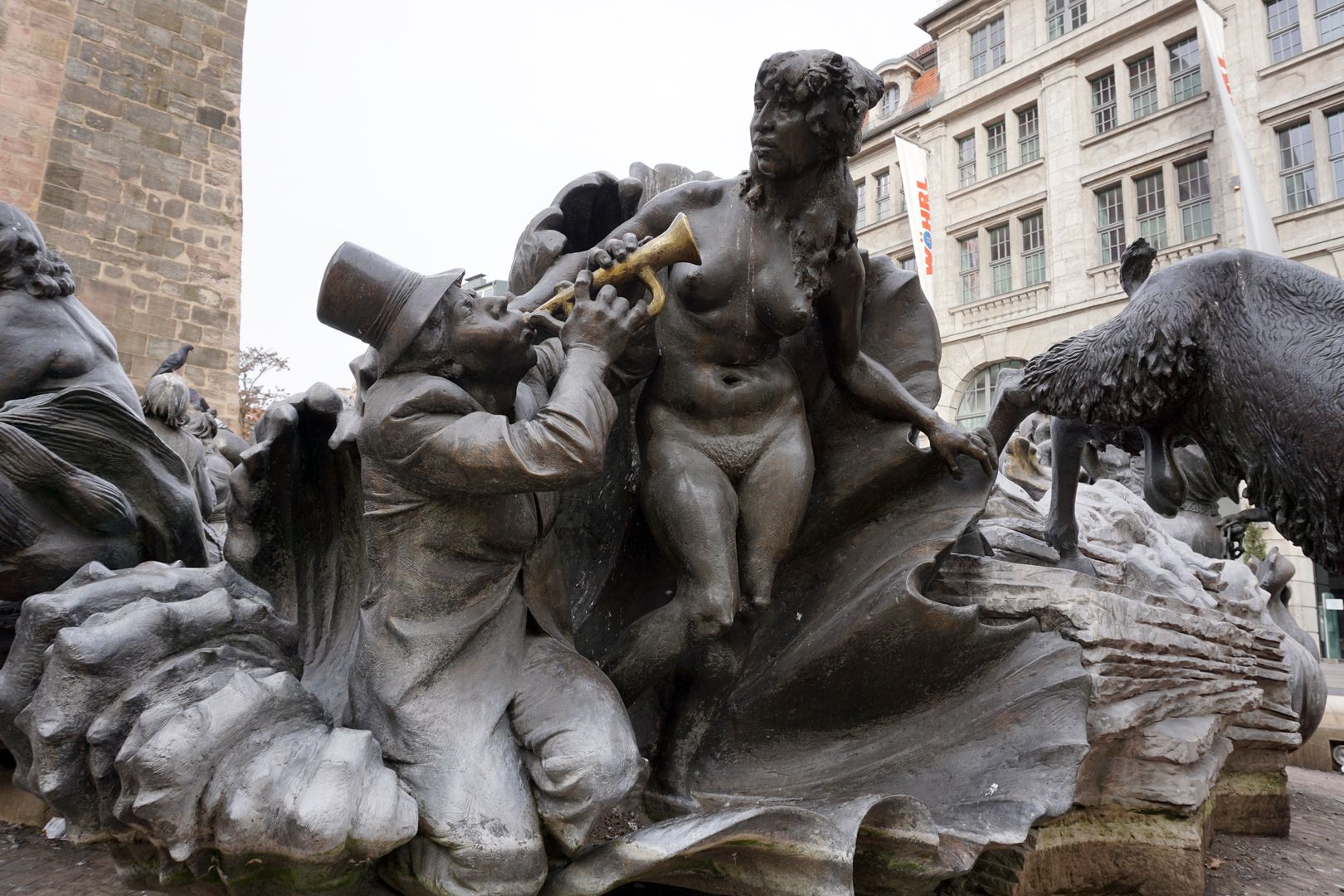 Marriage carousel/ Hans Sachs Fountain "Venus clam"/"He sings of naked beauty with his instrument, the shell becomes a fairground stall" (J.W.)