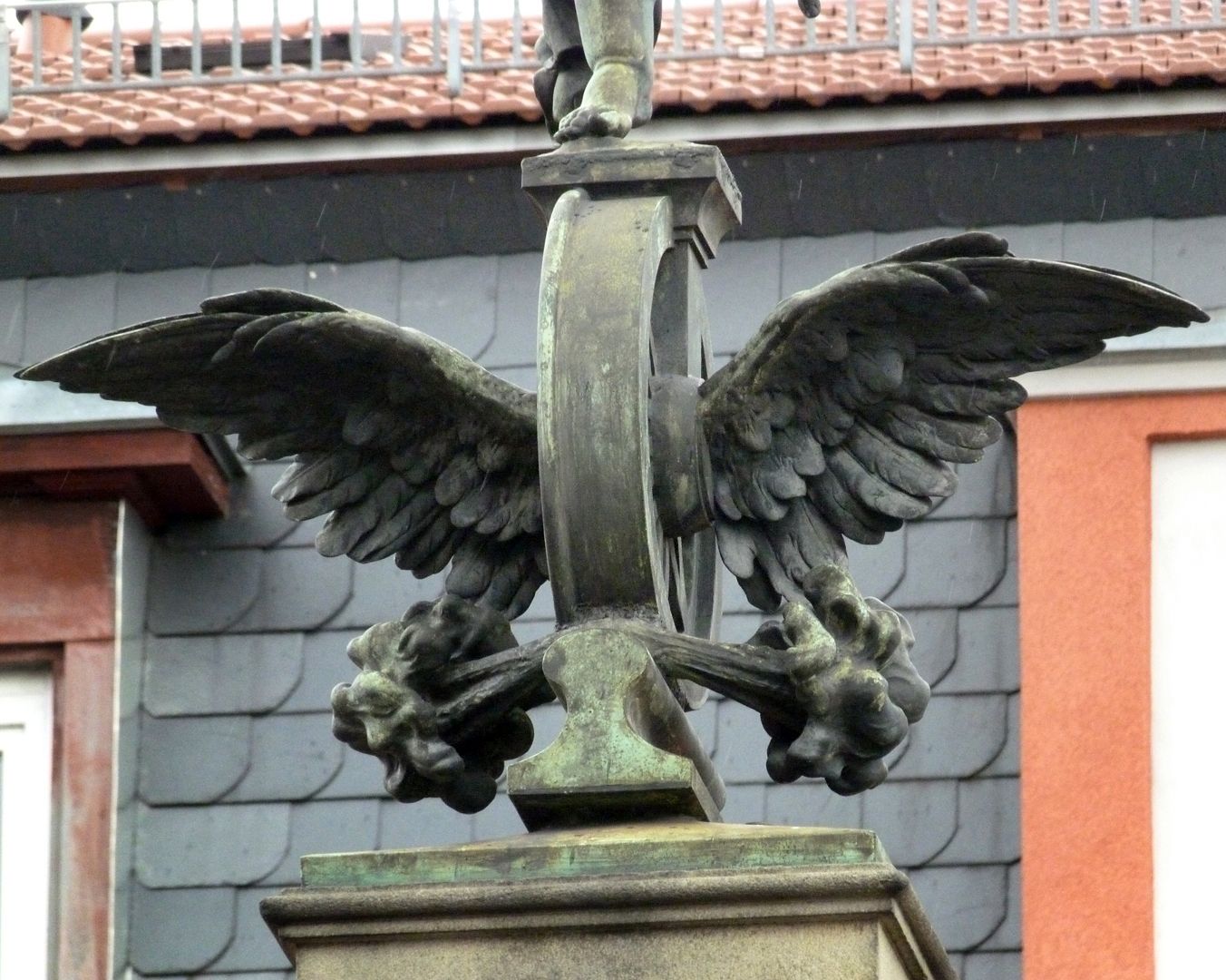 Memorial to King Ludwig´s Railway (Ludwigseisenbahn) Detailed view with a winged wheel as a symbol of the railway and rail transport, steaming over a piece of rail