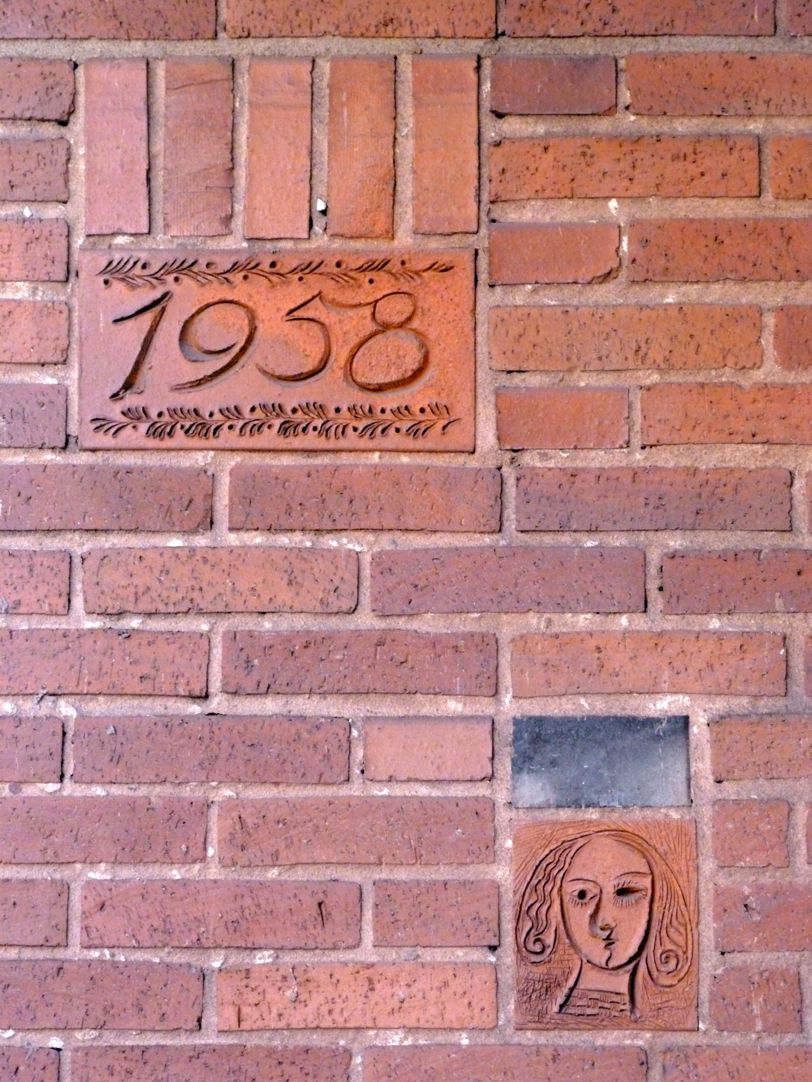 Residential- and business building Detail of the entrance area with date
