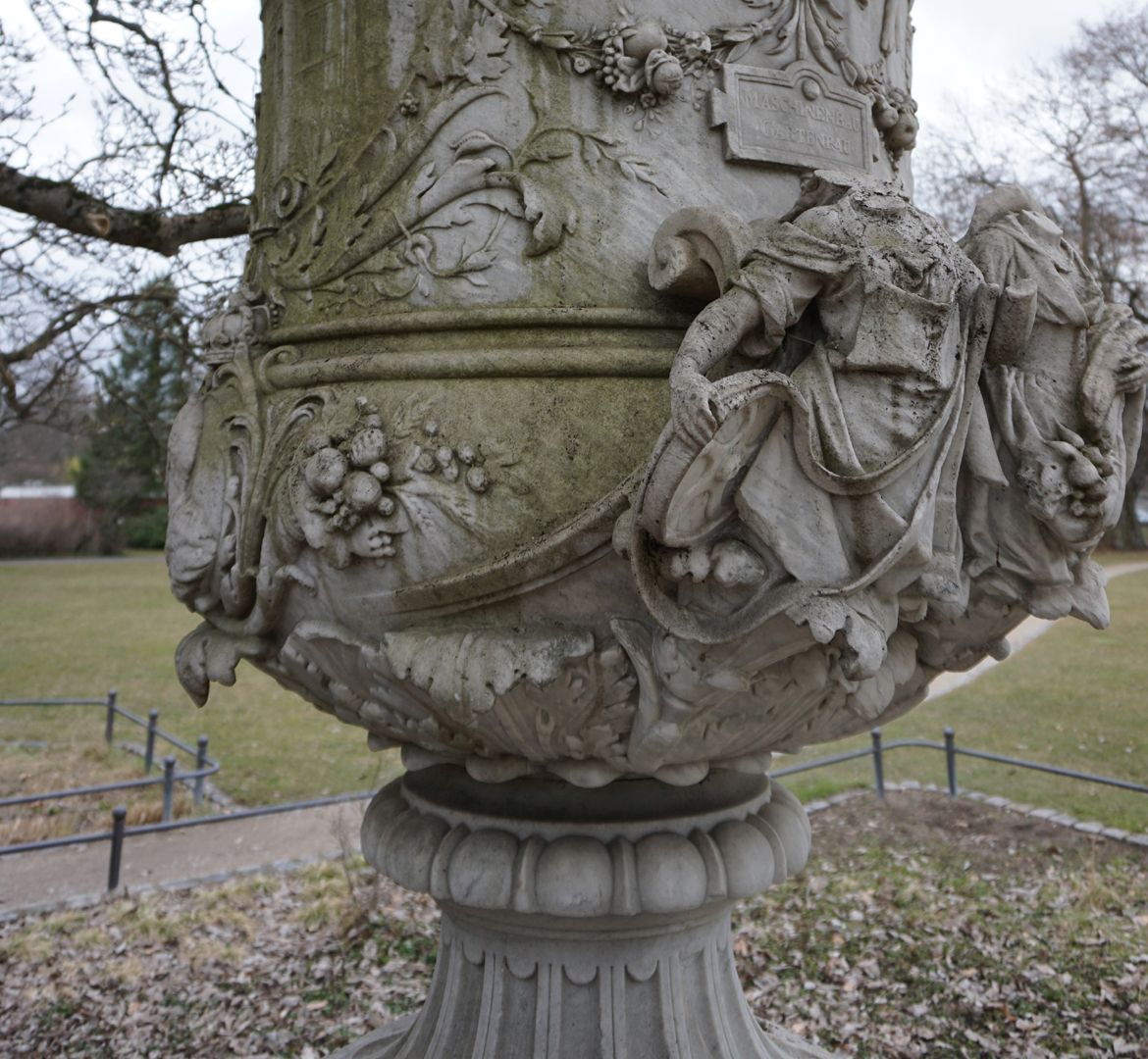 Marble Vase in Memory of the Bavarian State Exhibition 1882 View from the west, severed heads of the personified mechanical engineering and horticulture