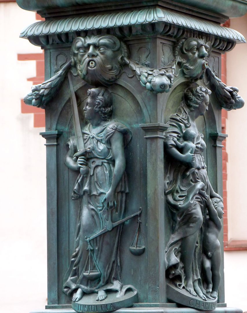 Fountain of Justice (Frankfurt a.M.) Brunnenstock with the depiction of Justitia (north side) and Caritas (west side)