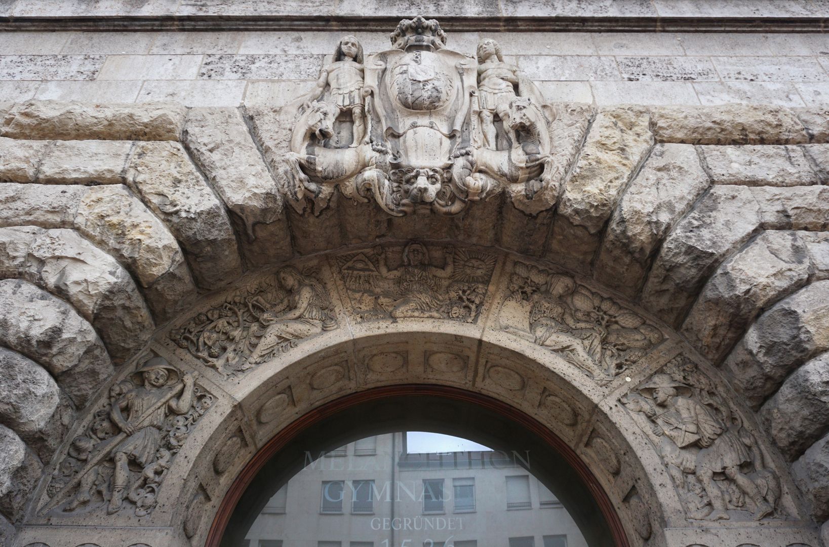 facade decoration at Melanchthon-Gymnasium Round arch over the main entrance