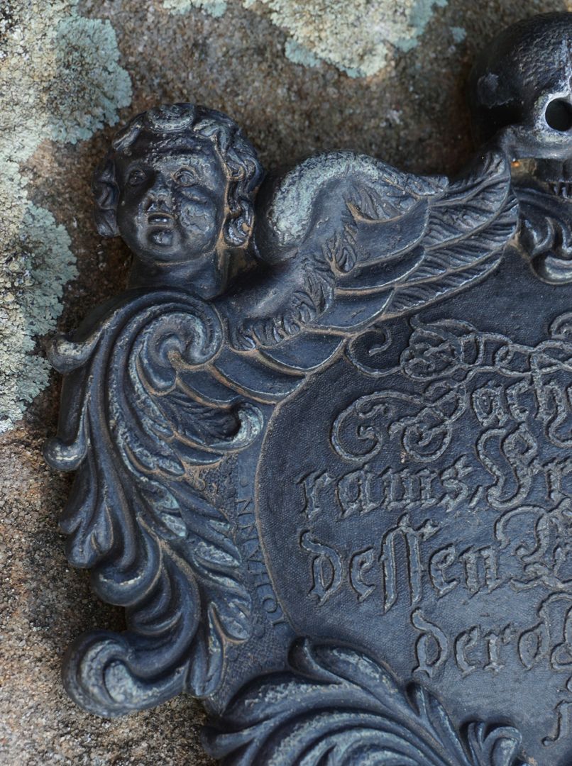Epitaph of Zacharias Wolffram Detail view with cherub, next to it the artist´s first name