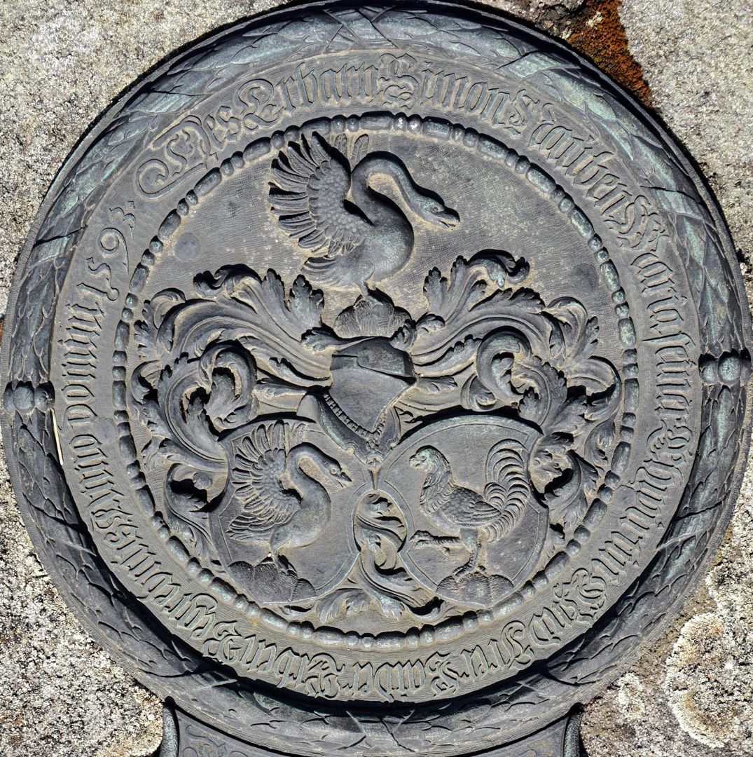St. John's cemetery grave 1446 above: Coat of arms medallion of Simon Naub and wife Maria