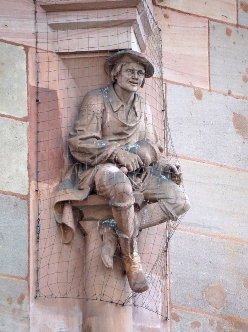 Selbstportrait Erker zum Hefnersplatz, Steinmetzfigur als Konsolenträger (Atlant)