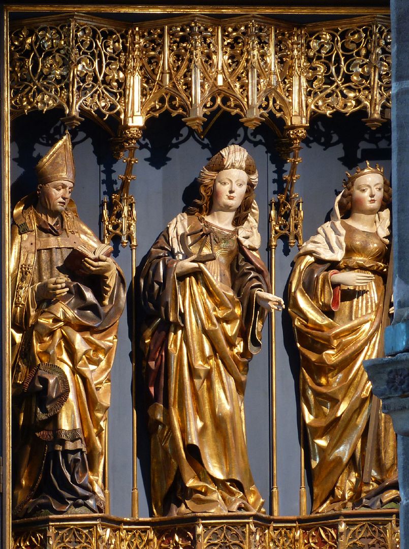 St Catherine's reredos of Levinus Memminger Shrine with Bishop Levinus [Livinus] of Ghent with book, St. Catherine with wheel and St. Helena with the cross (here view slightly obscured by pillars)