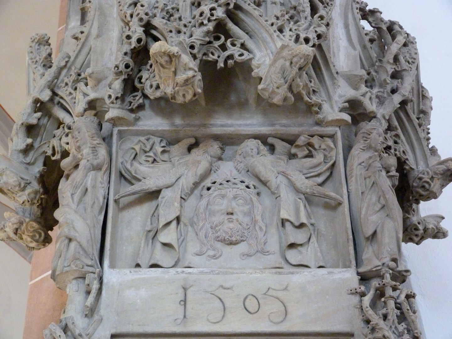 Sacrament house in Schwabach South side, relief panel above the tabernacle with Veronica's handkerchief and the date 1505