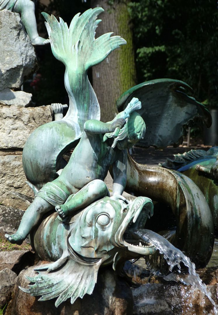 Neptun-Fountain Putto sitting on a fish