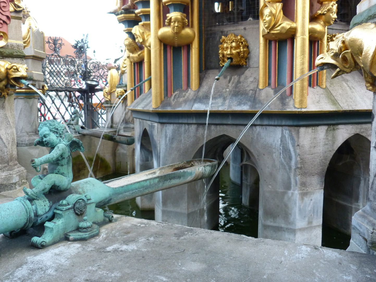 Beautiful fountain Tube at the basin edge with Renaissance putto