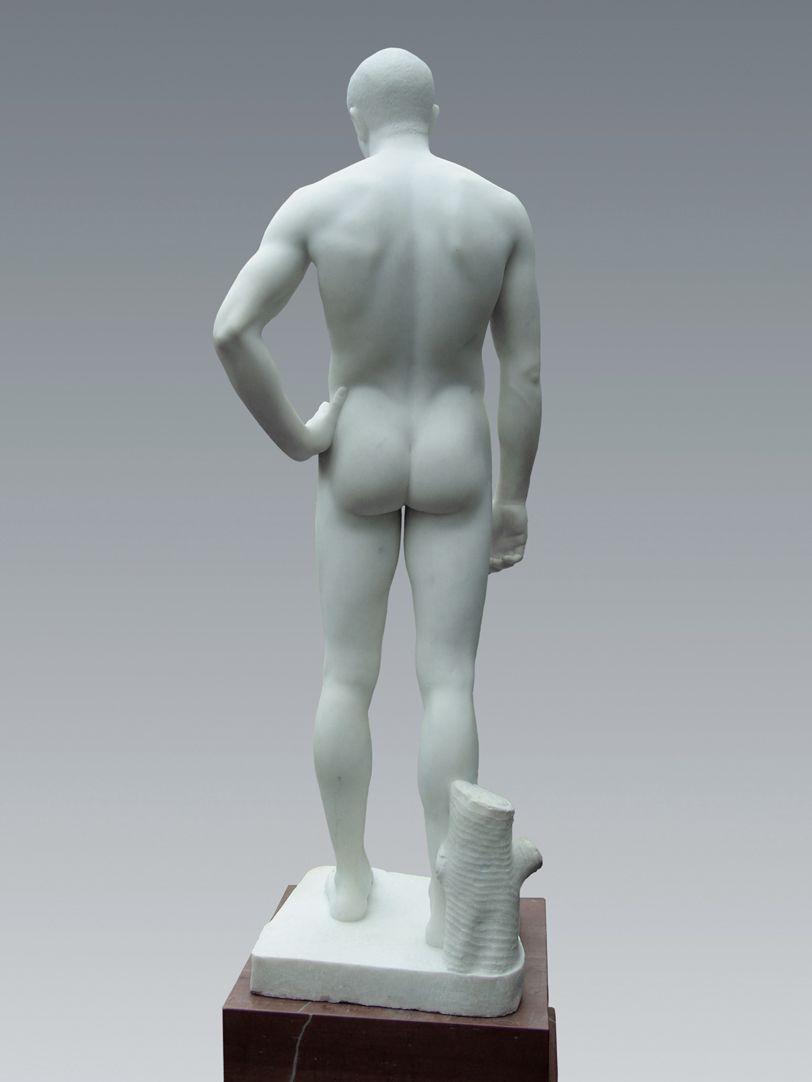 Young man standing View from the back
